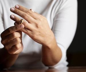 Woman taking off a ring